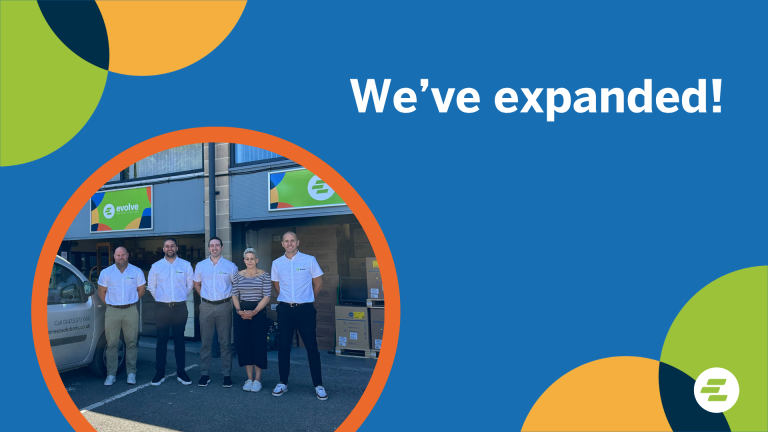 Team members from Evolve Business Solutions standing outside the company's expanded warehouse and office premises in Suffolk following its latest business expansion.